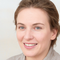 Joyful white young-adult female with medium  brown hair and blue eyes