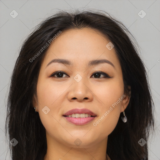 Joyful asian young-adult female with long  brown hair and brown eyes