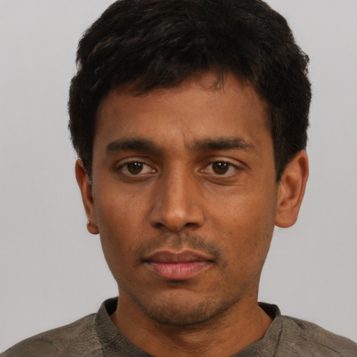 Neutral latino young-adult male with short  brown hair and brown eyes