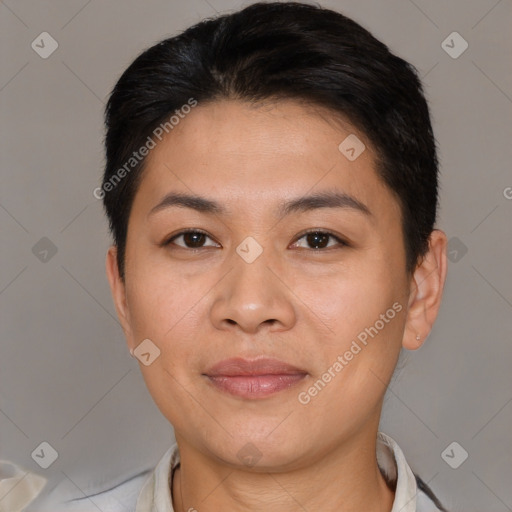 Joyful asian young-adult female with short  black hair and brown eyes