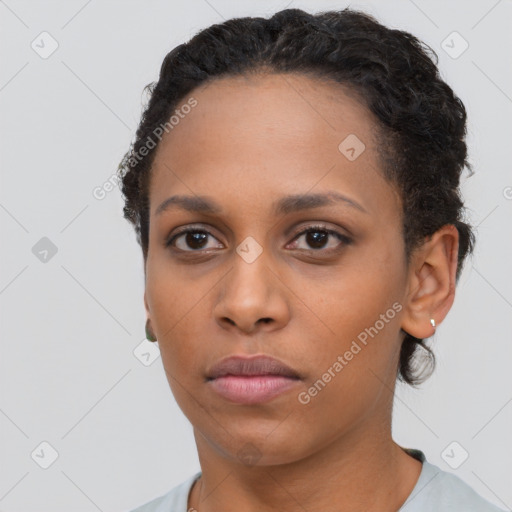 Neutral black young-adult female with short  black hair and brown eyes