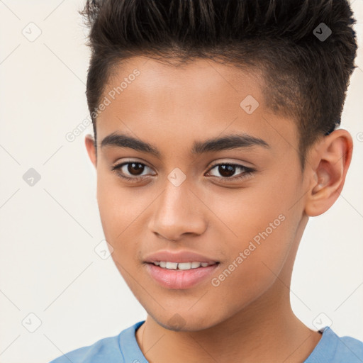 Joyful white child male with short  brown hair and brown eyes