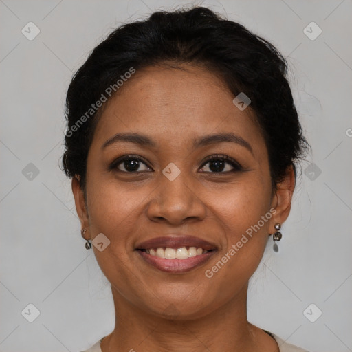 Joyful latino young-adult female with short  brown hair and brown eyes