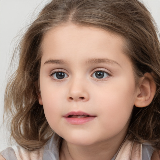 Neutral white child female with medium  brown hair and brown eyes