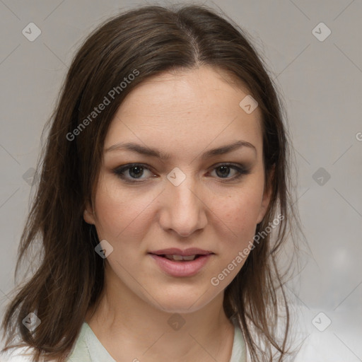 Joyful white young-adult female with medium  brown hair and brown eyes