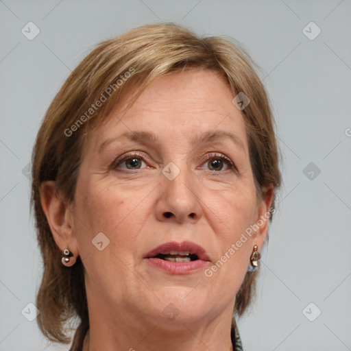 Joyful white adult female with medium  brown hair and grey eyes