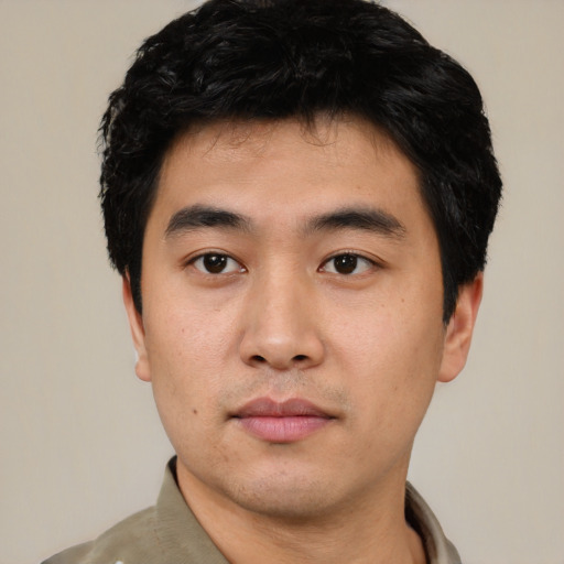 Neutral asian young-adult male with short  black hair and brown eyes