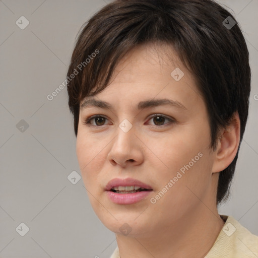 Joyful white young-adult female with medium  brown hair and brown eyes