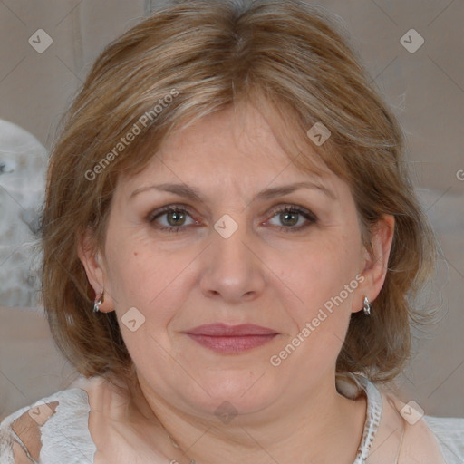 Joyful white adult female with medium  brown hair and brown eyes