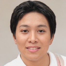 Joyful asian young-adult female with short  black hair and brown eyes