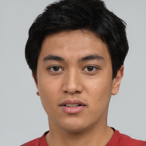 Neutral asian young-adult male with short  black hair and brown eyes