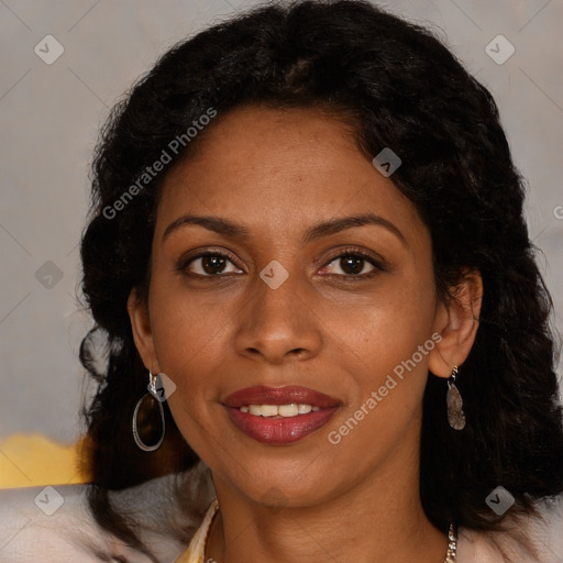 Joyful black young-adult female with long  brown hair and brown eyes