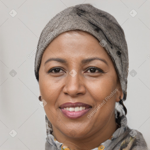 Joyful black adult female with short  brown hair and brown eyes