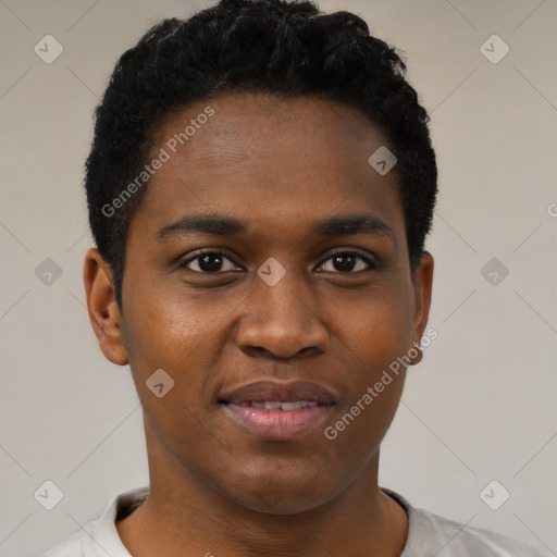 Joyful black young-adult male with short  brown hair and brown eyes