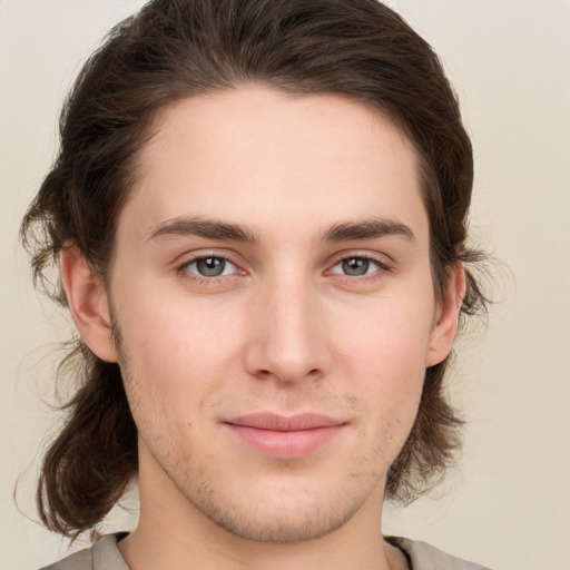 Neutral white young-adult male with medium  brown hair and brown eyes