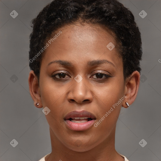 Joyful black young-adult female with short  brown hair and brown eyes