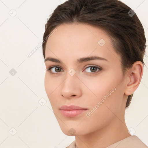 Neutral white young-adult female with short  brown hair and brown eyes