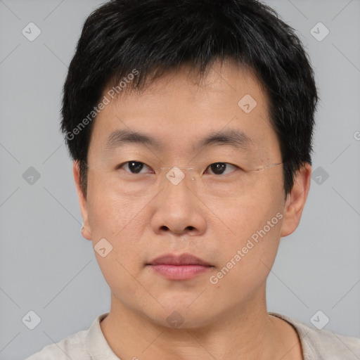 Neutral asian young-adult male with short  brown hair and brown eyes