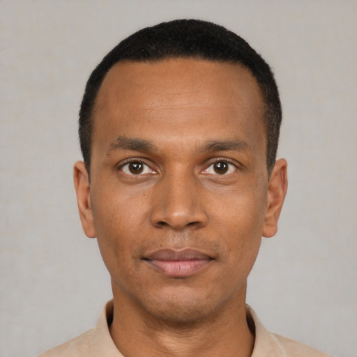 Neutral black young-adult male with short  black hair and brown eyes
