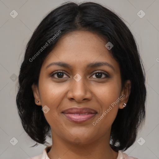 Joyful black young-adult female with medium  brown hair and brown eyes