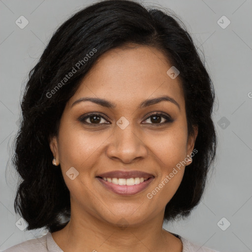 Joyful latino young-adult female with medium  brown hair and brown eyes