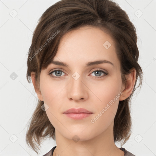 Neutral white young-adult female with medium  brown hair and grey eyes