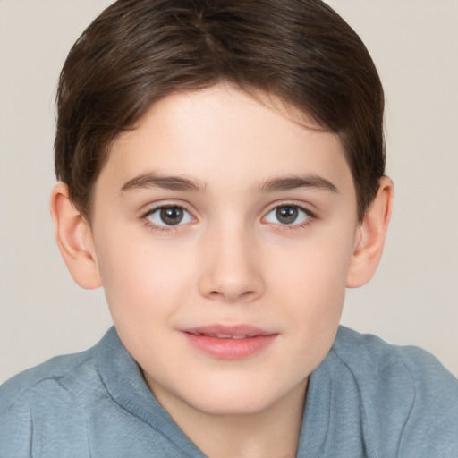 Joyful white child female with short  brown hair and brown eyes