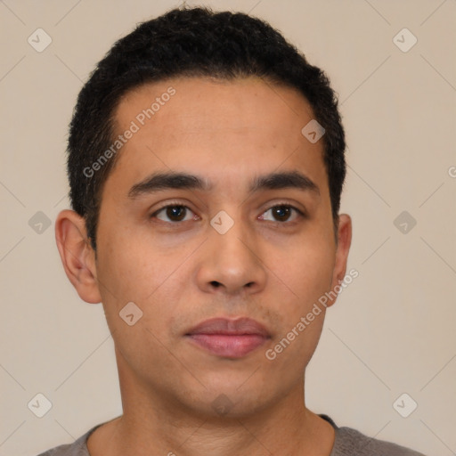 Neutral latino young-adult male with short  black hair and brown eyes