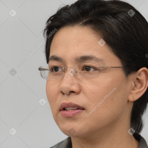 Neutral white young-adult female with medium  brown hair and brown eyes