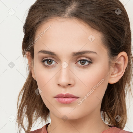 Neutral white young-adult female with long  brown hair and brown eyes