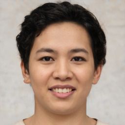 Joyful asian young-adult female with short  black hair and brown eyes