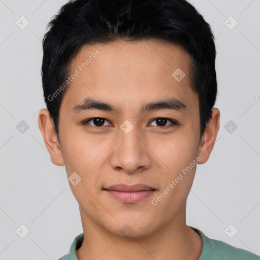 Joyful asian young-adult male with short  black hair and brown eyes