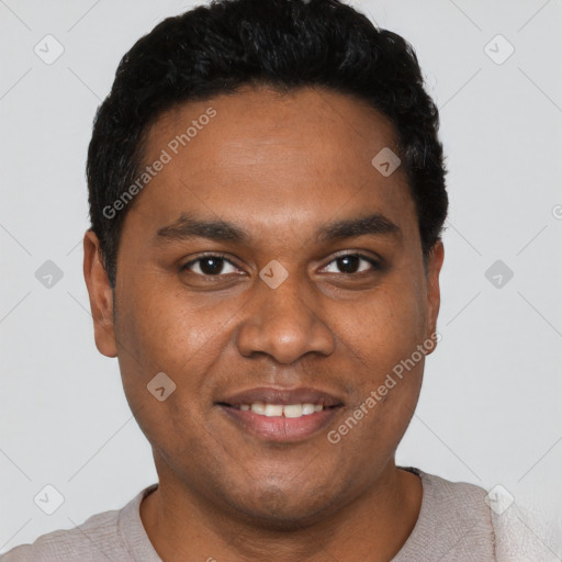 Joyful black young-adult male with short  black hair and brown eyes
