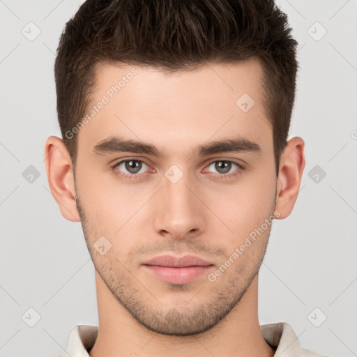 Neutral white young-adult male with short  brown hair and brown eyes