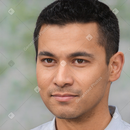 Joyful white young-adult male with short  black hair and brown eyes