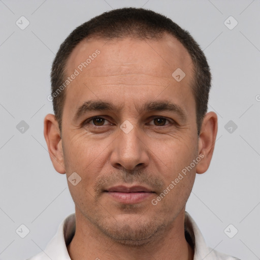 Joyful white adult male with short  brown hair and brown eyes