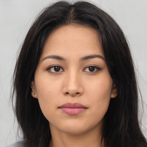 Neutral asian young-adult female with long  brown hair and brown eyes