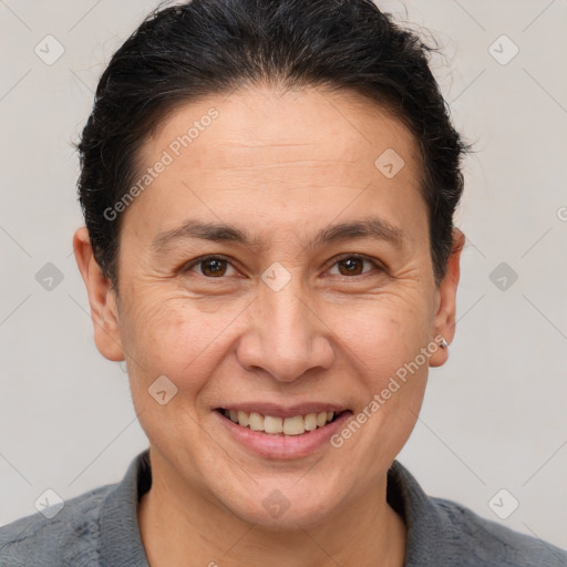 Joyful white adult female with short  brown hair and brown eyes