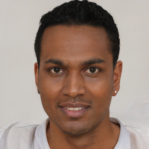 Neutral black young-adult male with short  black hair and brown eyes