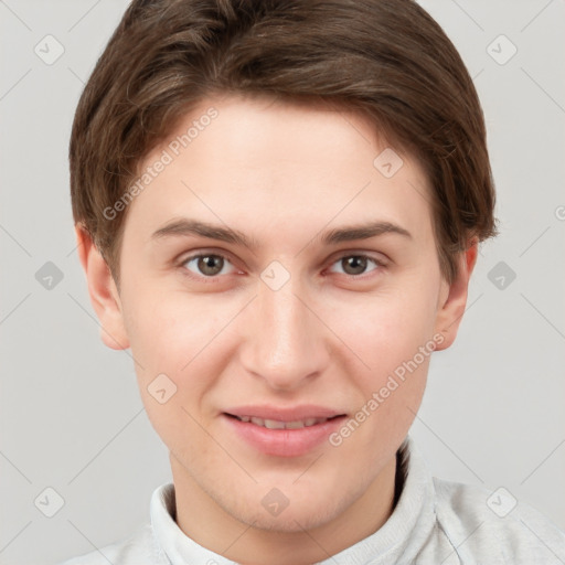 Joyful white young-adult female with short  brown hair and grey eyes