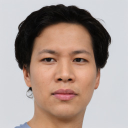 Neutral asian young-adult male with short  brown hair and brown eyes