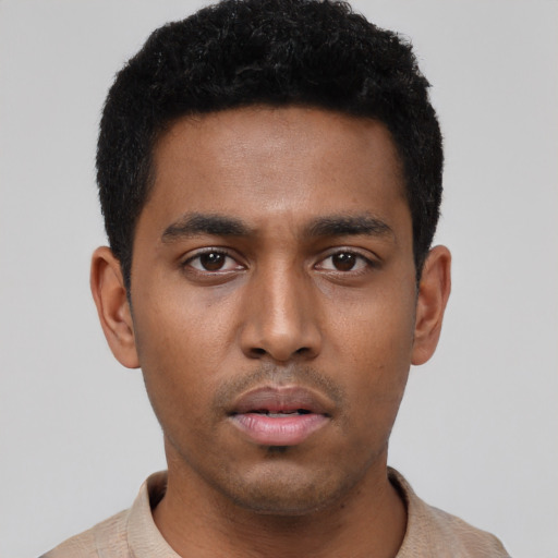 Neutral black young-adult male with short  black hair and brown eyes