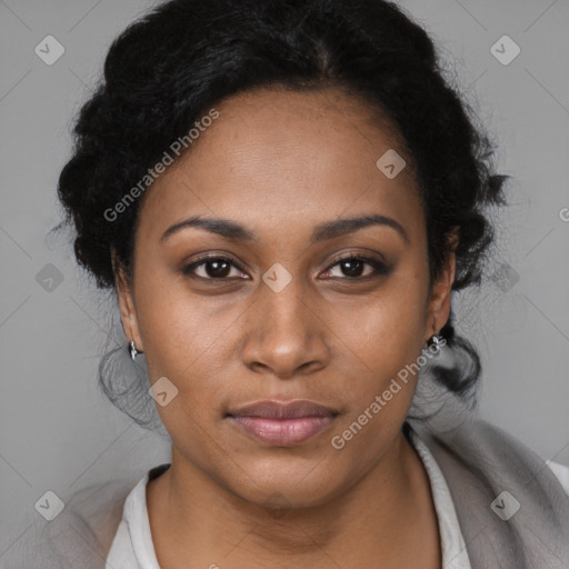 Joyful black young-adult female with long  black hair and brown eyes