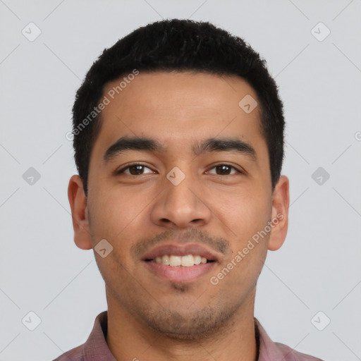 Joyful latino young-adult male with short  black hair and brown eyes