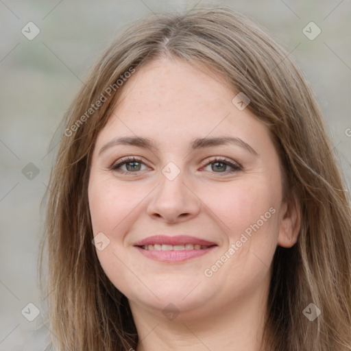 Joyful white young-adult female with long  brown hair and grey eyes