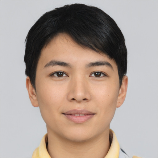 Joyful asian young-adult male with short  brown hair and brown eyes