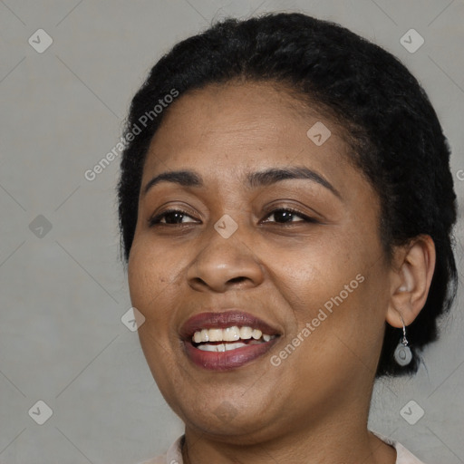 Joyful latino young-adult female with medium  black hair and brown eyes