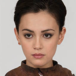 Neutral white young-adult female with short  brown hair and brown eyes