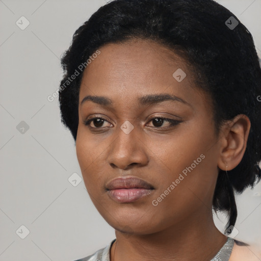 Neutral black young-adult female with short  black hair and brown eyes
