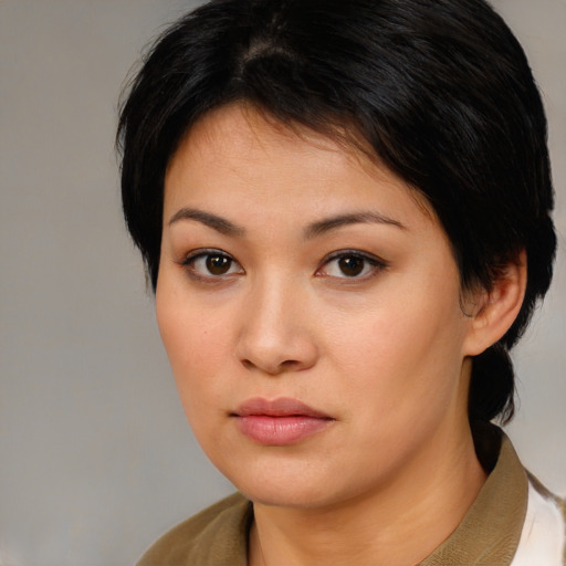 Neutral asian young-adult female with medium  brown hair and brown eyes